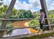 Polsek Menukung Pantau Debit Air dan Lokasi Rawan Dampak Bencana